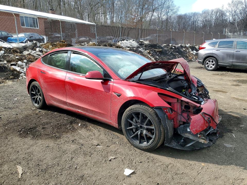 Photo 4 from auction – 2022 TESLA MODEL 3 with VIN 5YJ3E1EA9NF370359