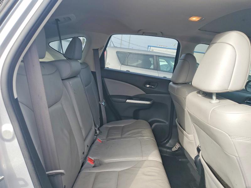 Photo 11 from auction – 2015 HONDA CR-V with VIN 2HKRM3H73FH550061