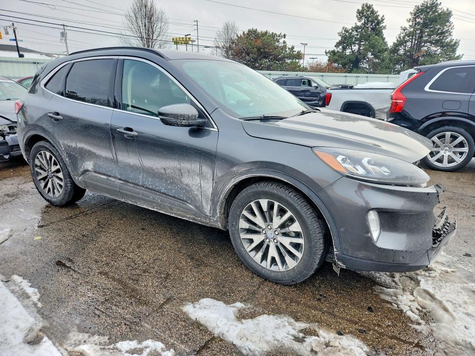 Photo 4 from auction – 2020 FORD ESCAPE TIT with VIN 1FMCU9DZ1LUA86538