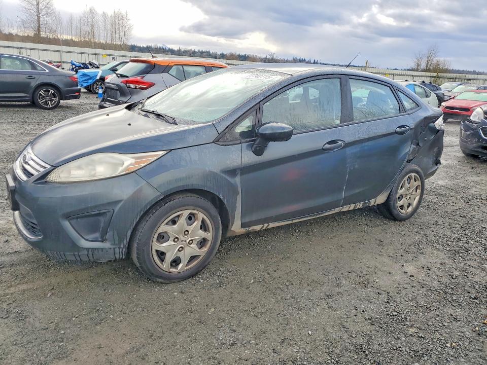 FORD FIESTA 2011 with VIN 3FADP4BJ5BM226132 - Photo from auction