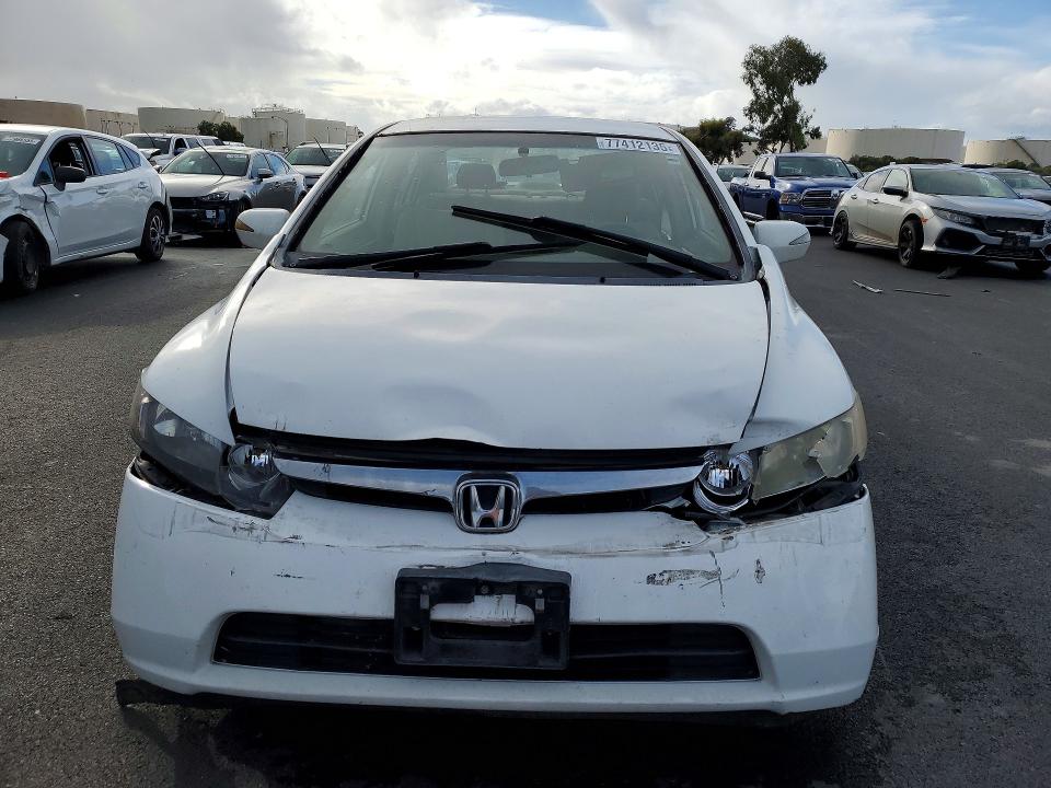 Photo 5 from auction – 2007 HONDA CIVIC HYBR with VIN JHMFA36267S025631
