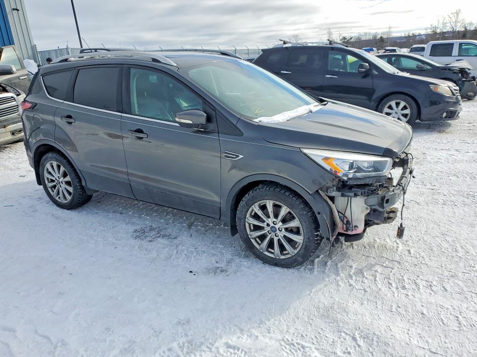 Photo 4 from auction – 2018 FORD ESCAPE TIT with VIN 1FMCU9J96JUB88094