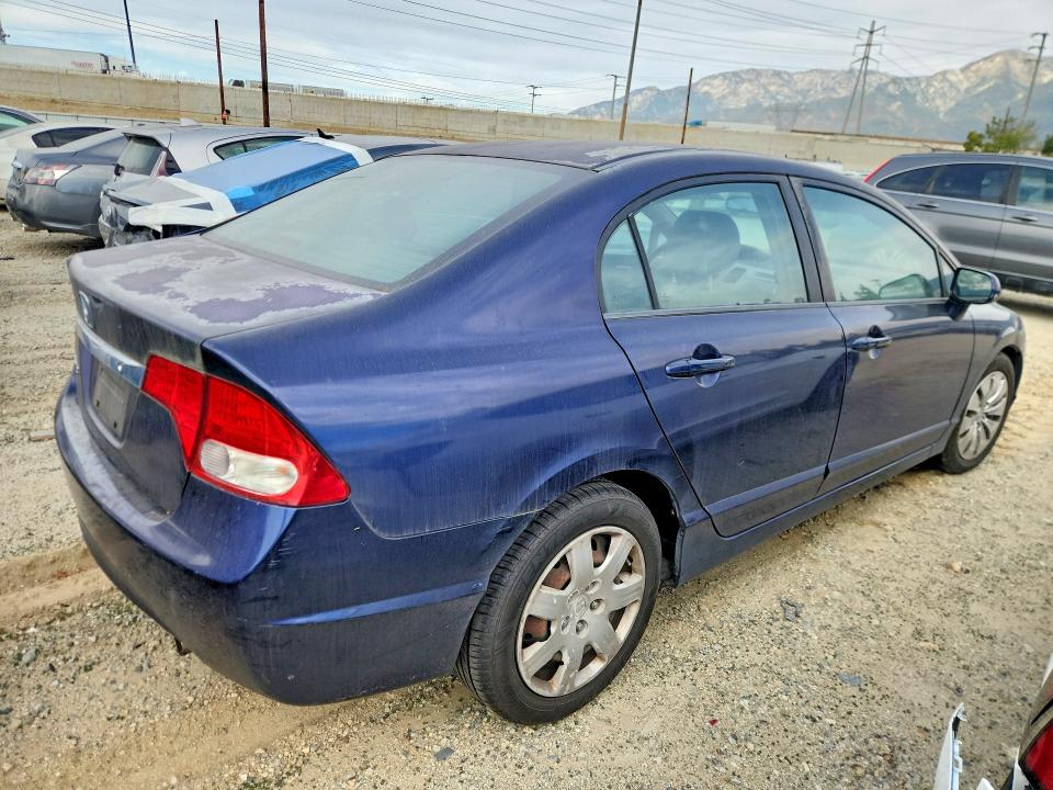 Photo 3 from auction – 2011 HONDA CIVIC LX with VIN 2HGFA1F50BH543722