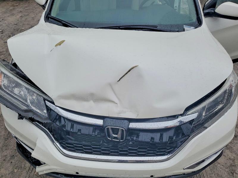 Photo 12 from auction – 2015 HONDA CR-V with VIN 5J6RM3H56FL013804