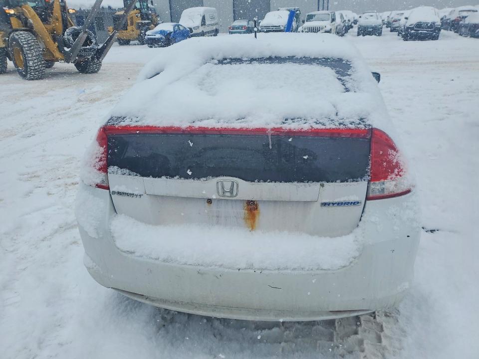 Photo 6 from auction – 2010 HONDA INSIGHT with VIN JHMZE2H75AS036793