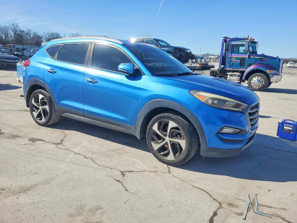 Photo 4 from auction – 2016 HYUNDAI TUCSON with VIN KM8J33A29GU251370