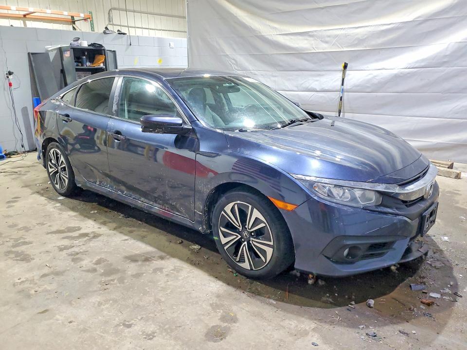 Photo 4 from auction – 2017 HONDA CIVIC with VIN 19XFC1E36HE011694