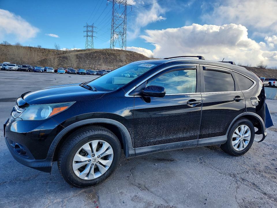 HONDA CR-V 2013 with VIN 2HKRM4H74DH631511 - Photo from auction