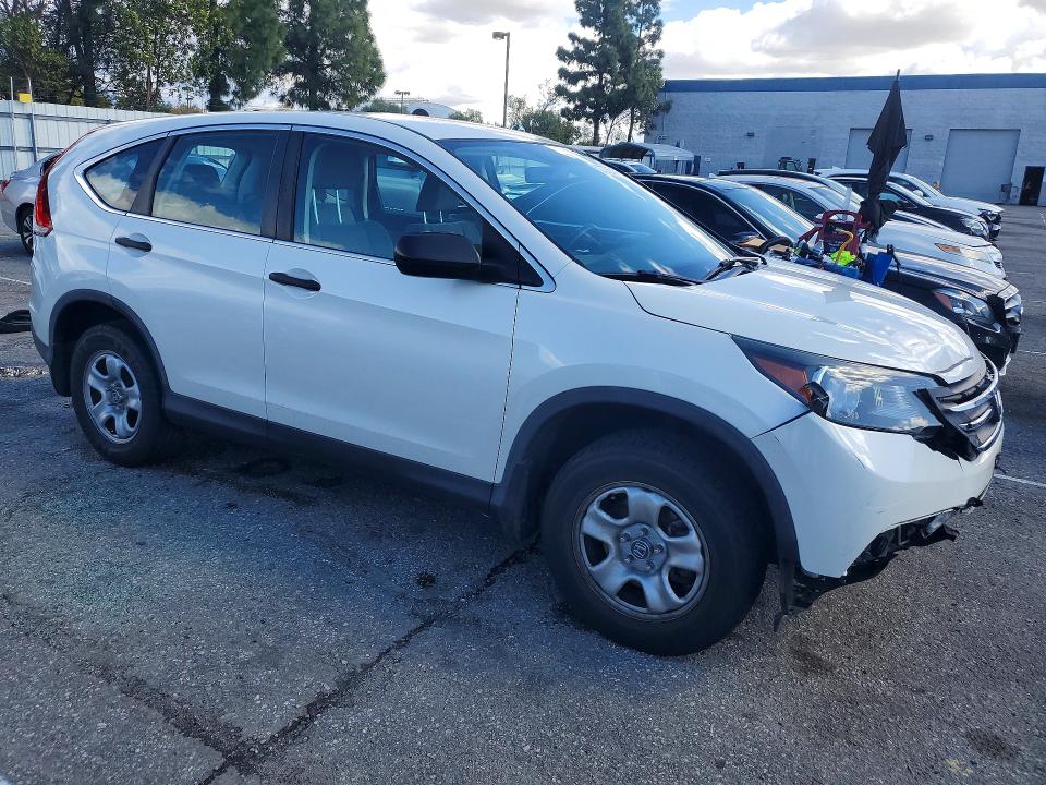 Photo 4 from auction – 2014 HONDA CR-V with VIN 5J6RM4H37EL004841