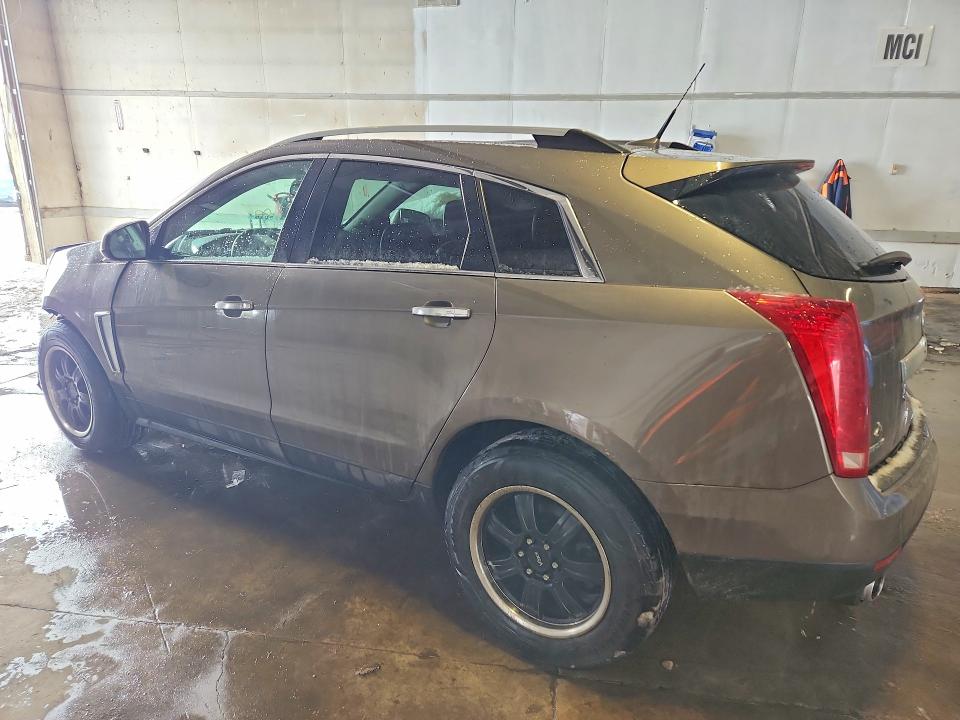 Photo 2 from auction – 2014 CADILLAC SRX LUXURY with VIN 3GYFNEE39ES676971