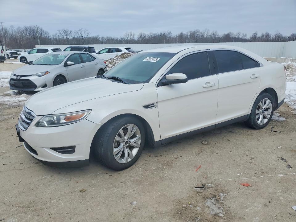 FORD TAURUS 2011 with VIN 1FAHP2EW0BG140928 - Photo from auction