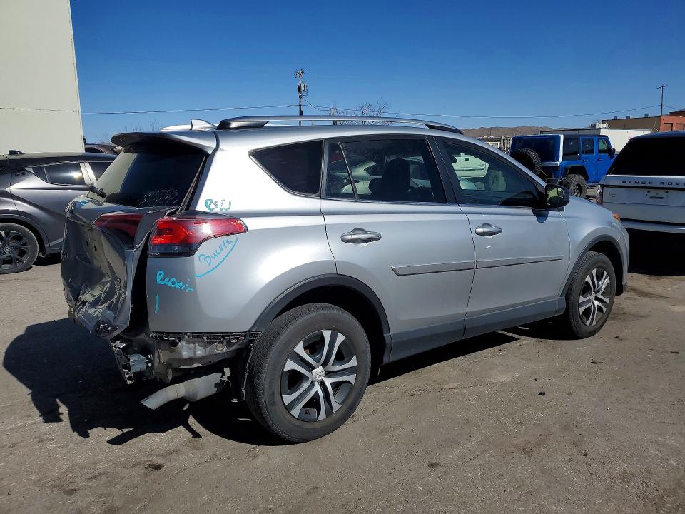 Photo 3 from auction – 2018 TOYOTA RAV4 LE with VIN JTMBFREV3JJ236802