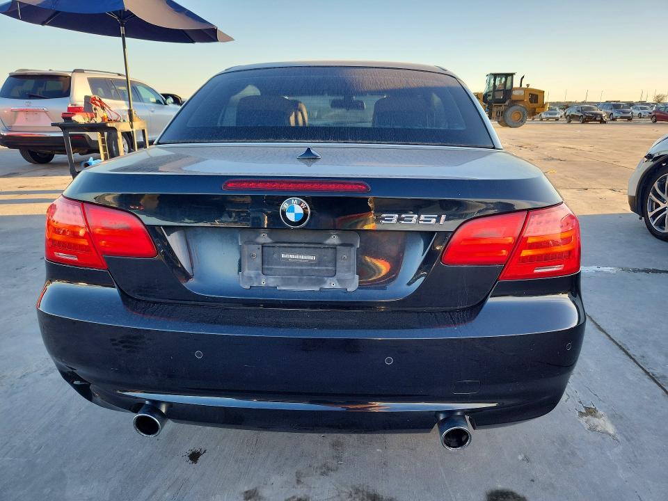 Photo 6 from auction – 2011 BMW 335 I with VIN WBADX7C59BE580638