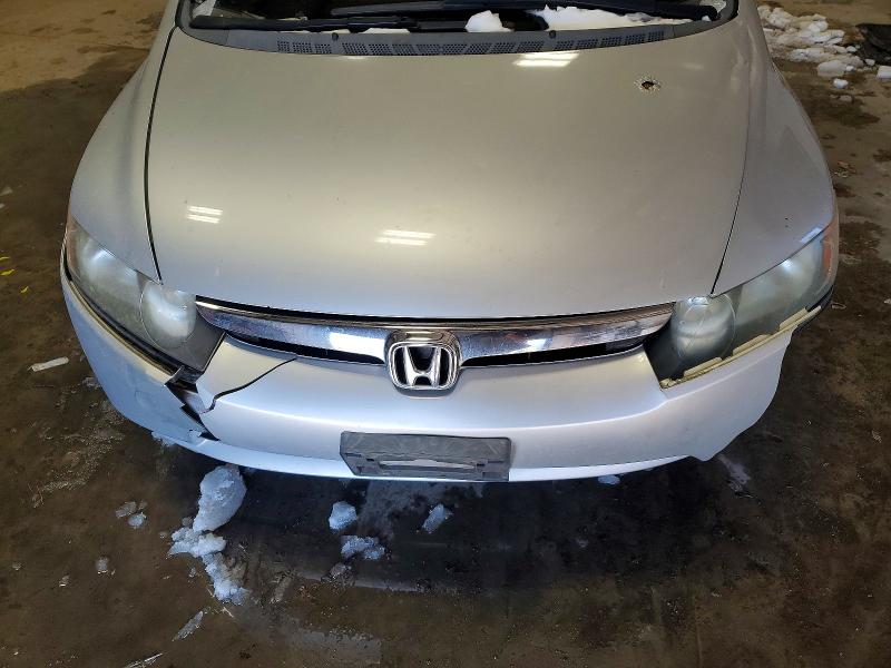 Photo 11 from auction – 2007 HONDA CIVIC LX with VIN 1HGFA16527L044821