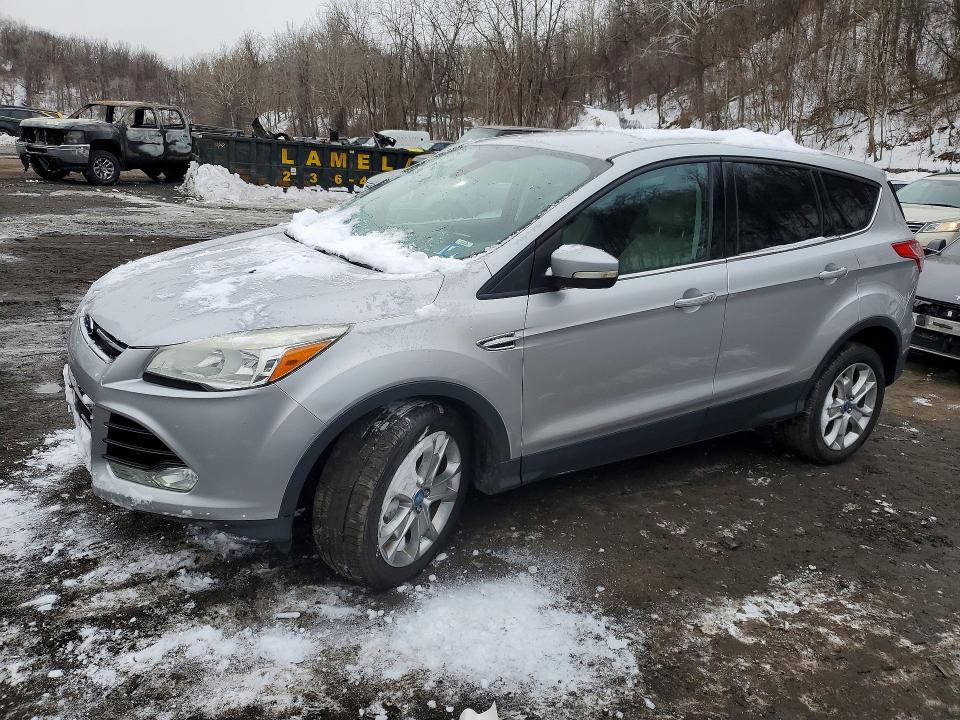 FORD ESCAPE 2013 with VIN 1FMCU9HXXDUB67869 - Photo from auction