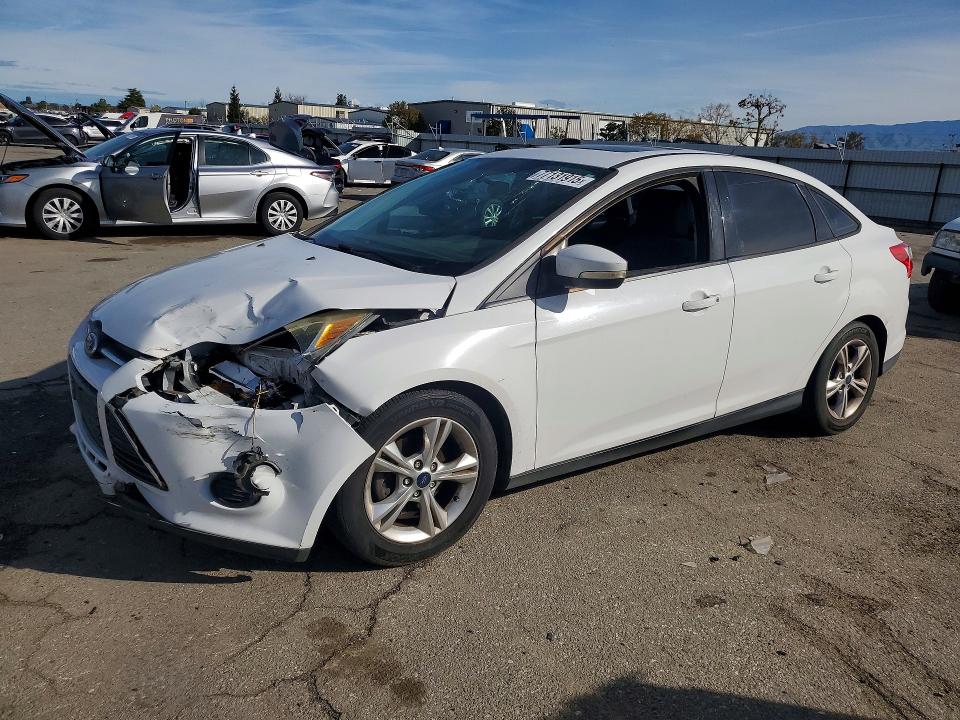 FORD FOCUS 2013 with VIN 1FADP3F21DL325953 - Photo from auction