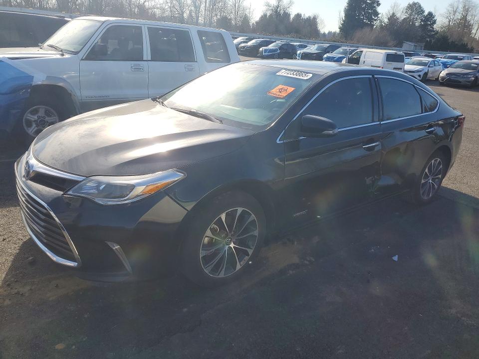 TOYOTA AVALON HYB 2016 with VIN 4T1BD1EB2GU049003 - Photo from auction