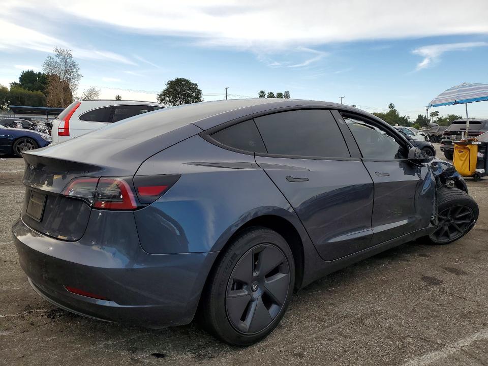 Photo 3 from auction – 2023 TESLA MODEL 3 with VIN 5YJ3E1EA1PF660839