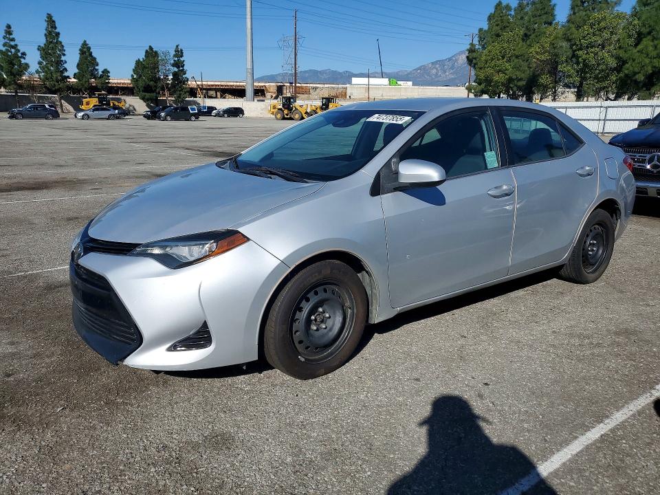 TOYOTA COROLLA 2017 with VIN 5YFBURHE1HP648563 - Photo from auction