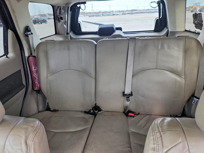 Photo 10 from auction – 2009 MERCURY MARINER PR with VIN 4M2CU877X9KJ19799