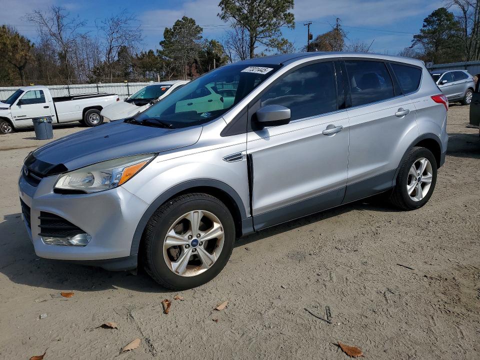 FORD ESCAPE 2014 with VIN 1FMCU0GX5EUC98108 - Photo from auction