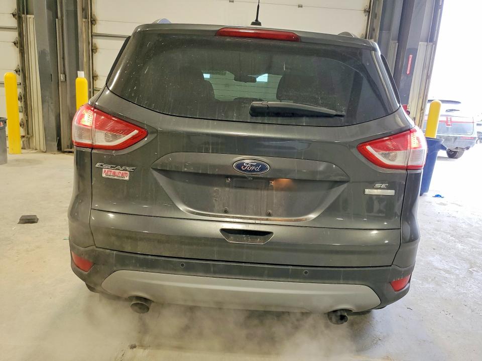 Photo 6 from auction – 2016 FORD ESCAPE with VIN 1FMCU0GX8GUC64585