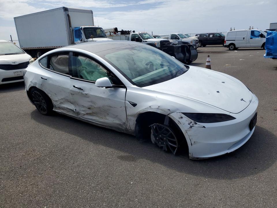 Photo 4 from auction – 2026 TESLA MODEL 3 with VIN 5YJ3E1EA9TF134792