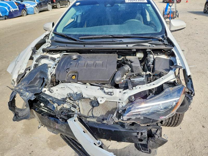 Photo 11 from auction – 2018 TOYOTA COROLLA with VIN 5YFBURHE2JP813039