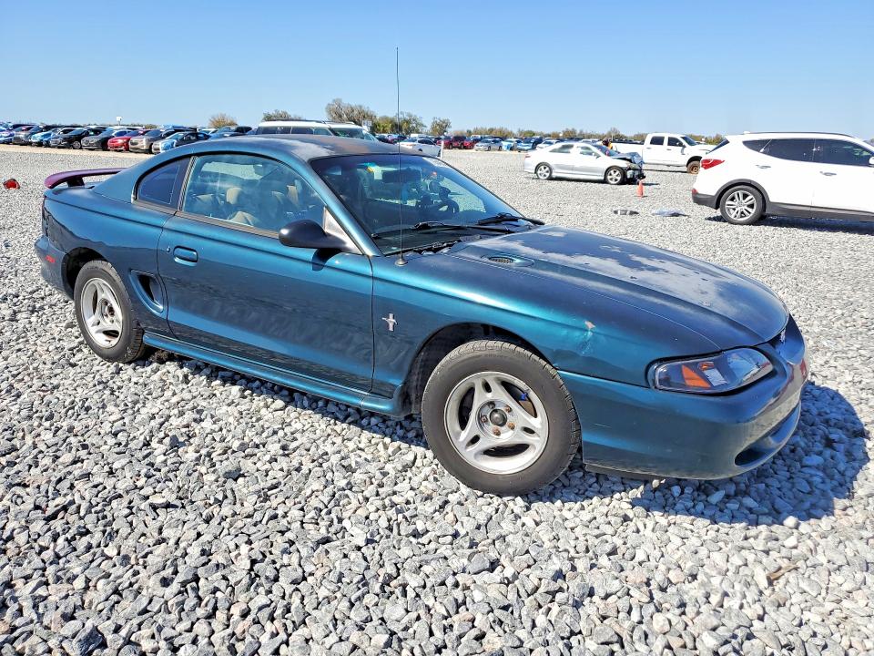 Photo 4 from auction – 1997 FORD MUSTANG with VIN 1FALP4041VF199783