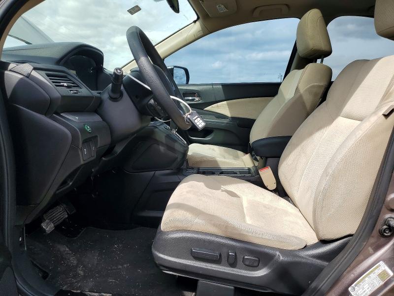 Photo 7 from auction – 2015 HONDA CR-V with VIN 3CZRM3H53FG704785