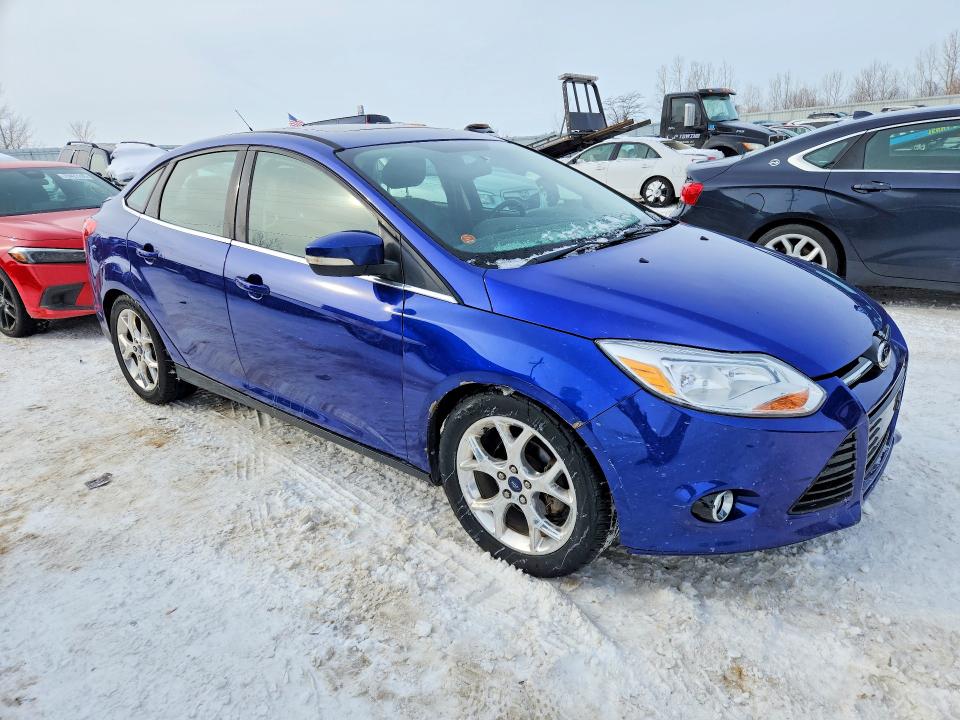 Photo 4 from auction – 2014 FORD FOCUS with VIN 1FADP3J21EL245884