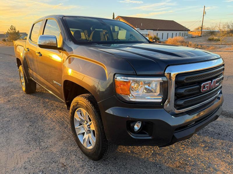 GMC CANYON 2015 with VIN 1GTG5AEA1F1220130 - Photo from auction