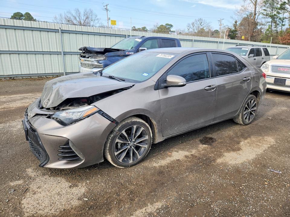 TOYOTA COROLLA 2017 with VIN 5YFBURHE4HP624239 - Photo from auction