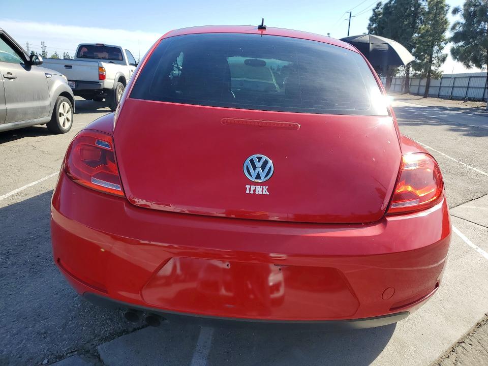 Photo 6 from auction – 2013 VOLKSWAGEN BEETLE with VIN 3VWFP7AT7DM644246