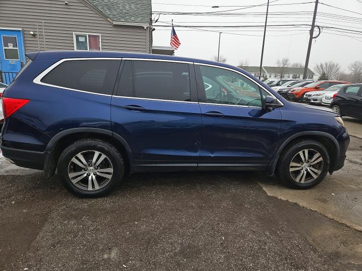 Photo 11 from auction – 2016 HONDA PILOT with VIN 5FNYF6H58GB057465