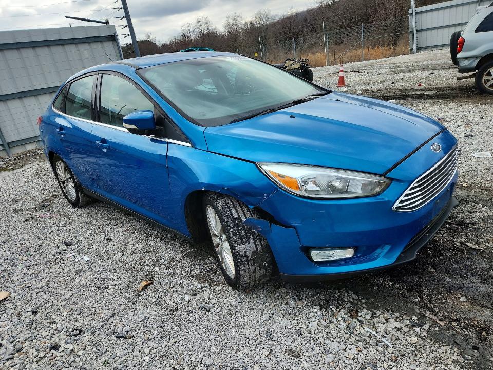 Photo 4 from auction – 2015 FORD FOCUS with VIN 1FADP3J28FL306889