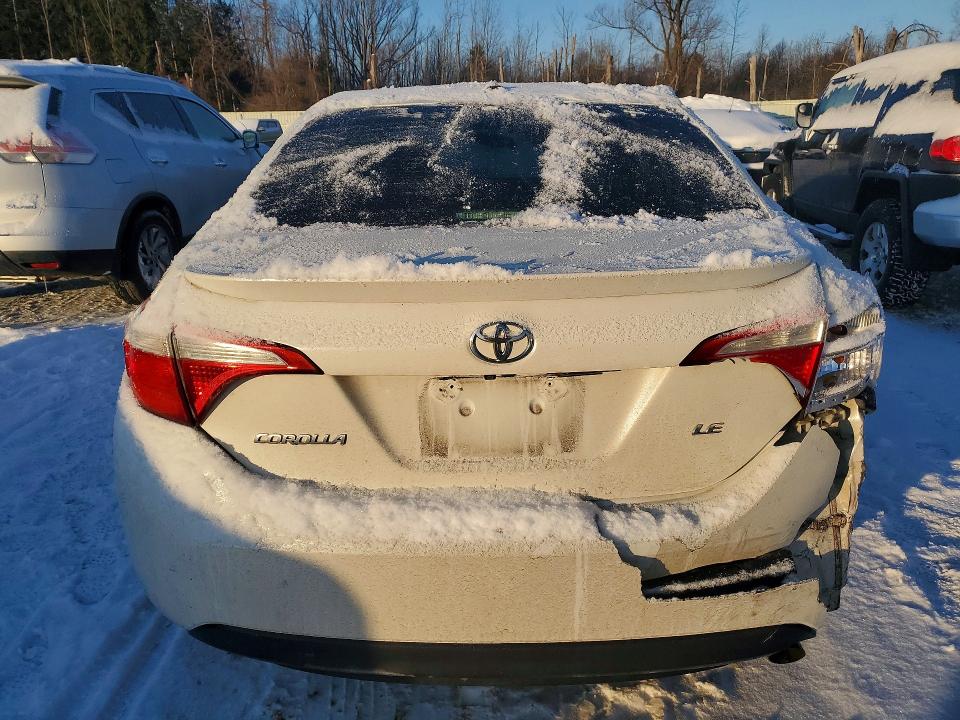 Photo 6 from auction – 2014 TOYOTA COROLLA EC with VIN 5YFBPRHE0EP021565
