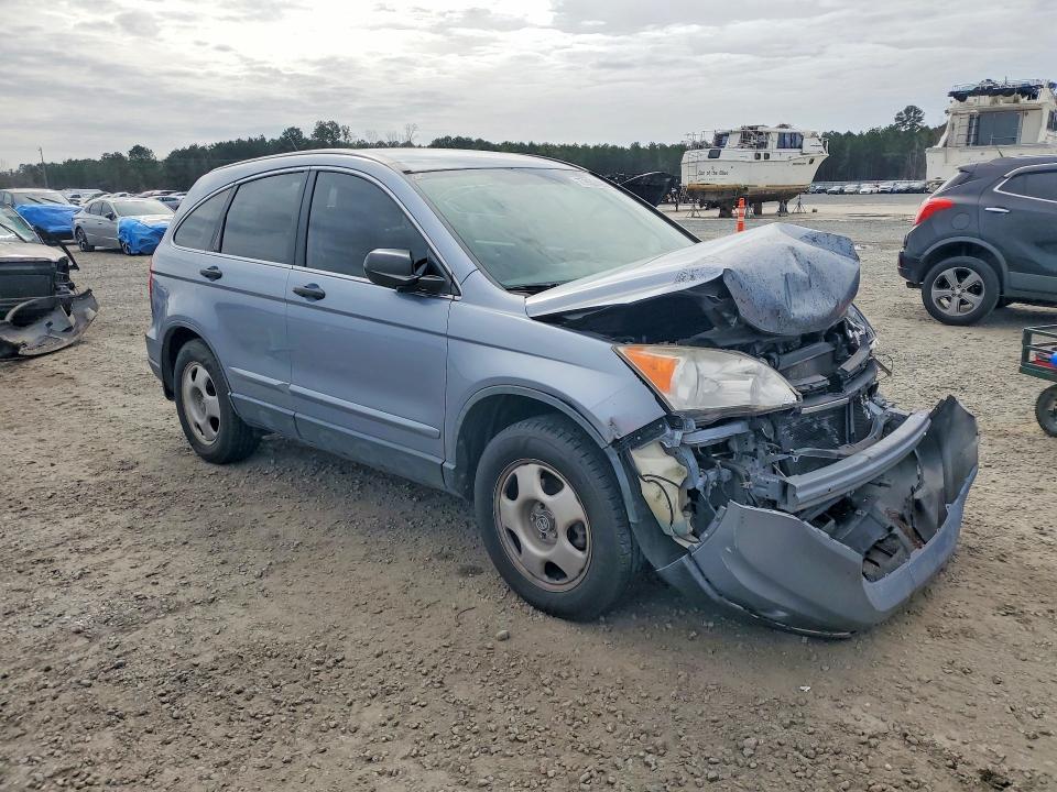 Photo 4 from auction – 2011 HONDA CR-V with VIN JHLRE4H33BC016180
