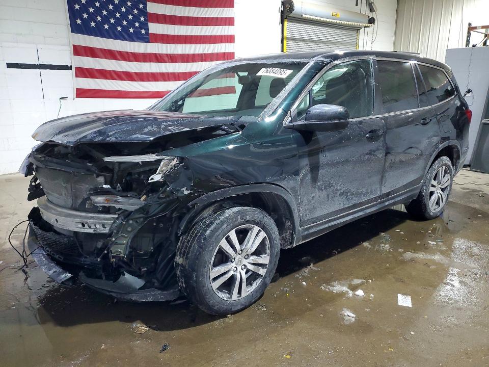 HONDA PILOT EXLN 2016 with VIN 5FNYF6H74GB059165 - Photo from auction