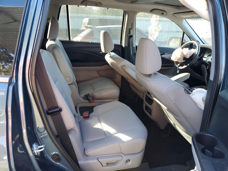 Photo 11 from auction – 2022 HONDA PILOT TOUR with VIN 5FNYF5H67NB024358