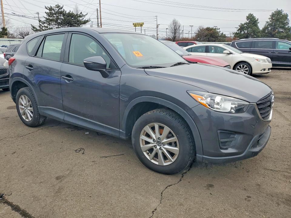 Photo 4 from auction – 2016 MAZDA CX-5 with VIN JM3KE2BY2G0863490