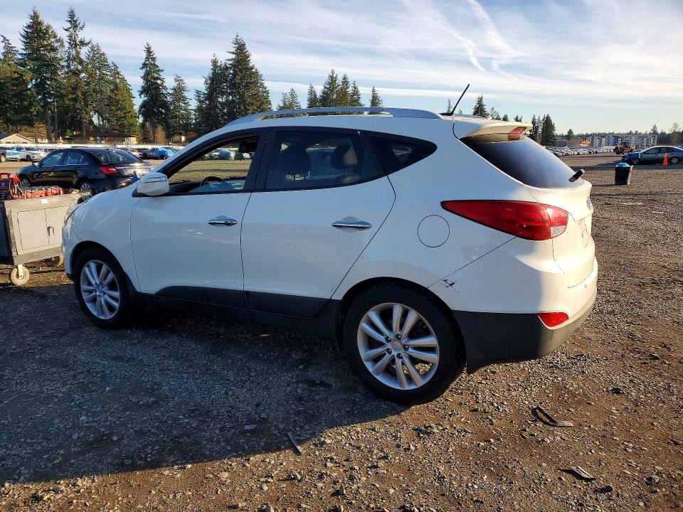 Photo 2 from auction – 2013 HYUNDAI TUCSON with VIN KM8JUCAC7DU559221