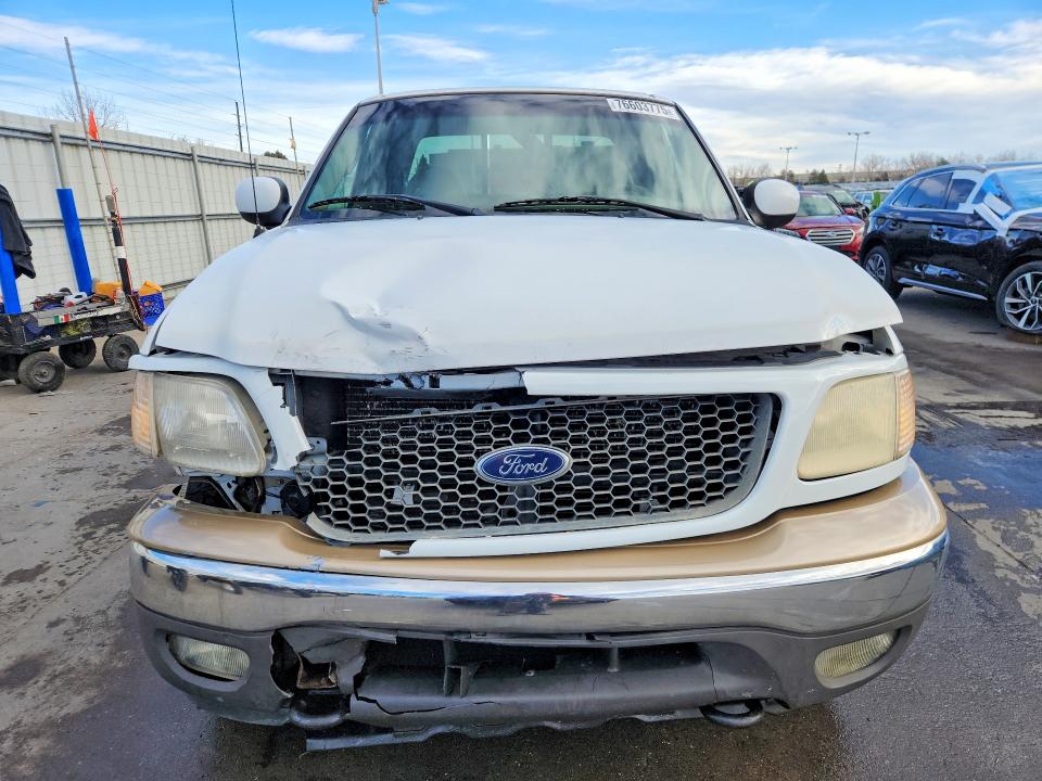 Photo 5 from auction – 2000 FORD F150 with VIN 2FTRX08L1YCB14479