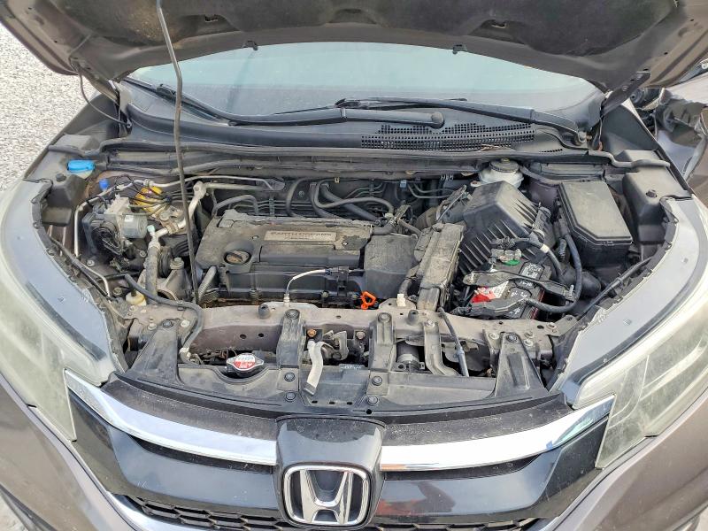Photo 12 from auction – 2015 HONDA CR-V with VIN 2HKRM4H35FH699302