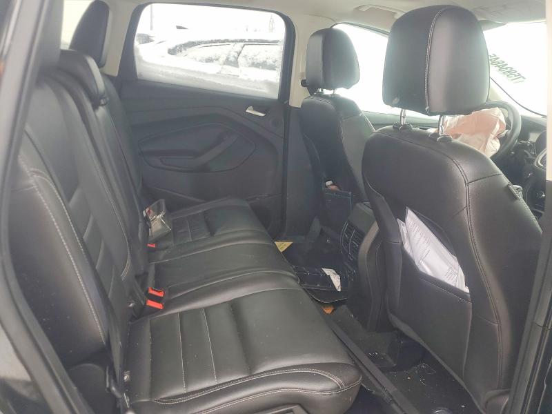 Photo 11 from auction – 2016 FORD ESCAPE with VIN 1FMCU9J98GUB87134