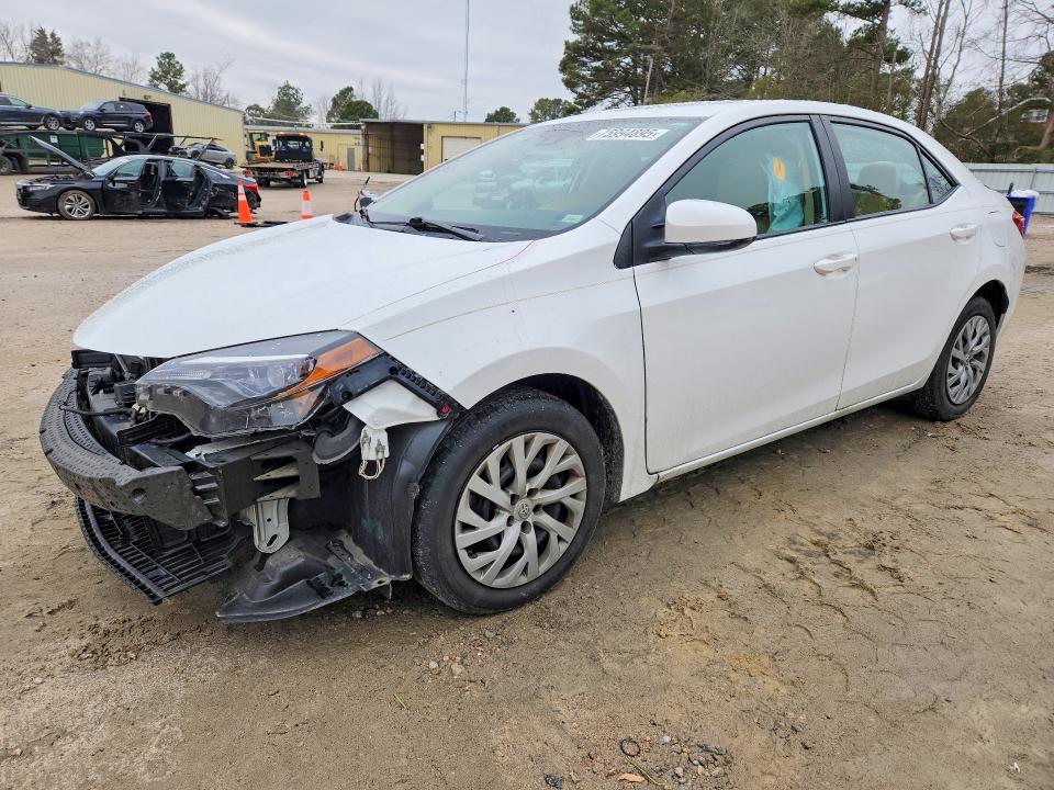 TOYOTA COROLLA L 2017 with VIN 5YFBURHE9HP665286 - Photo from auction