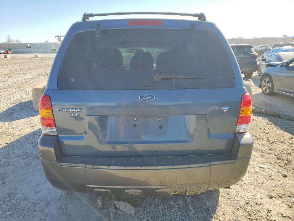 Photo 6 from auction – 2006 FORD ESCAPE with VIN 1FMYU03106KA41104