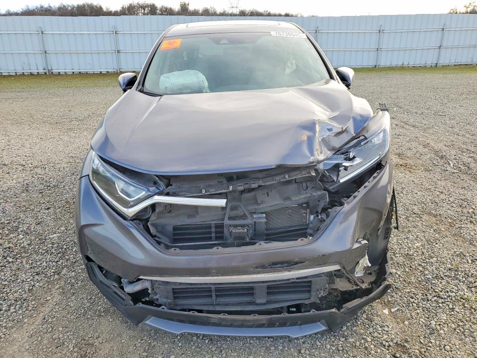 Photo 5 from auction – 2017 HONDA CR-V with VIN 2HKRW2H55HH646487