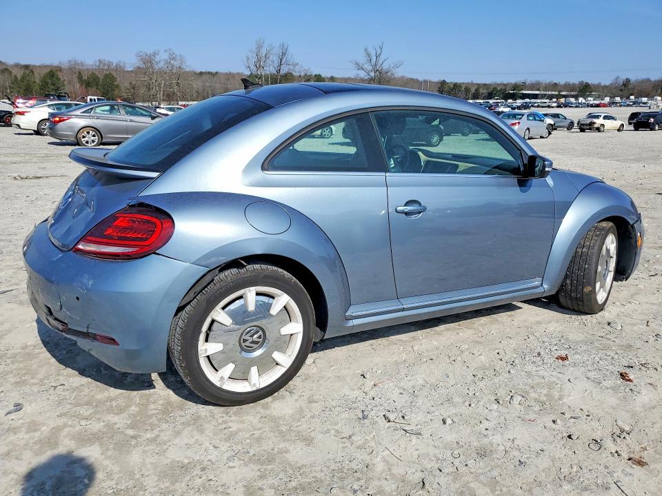 Photo 3 from auction – 2019 VOLKSWAGEN BEETLE with VIN 3VWFD7AT2KM719232