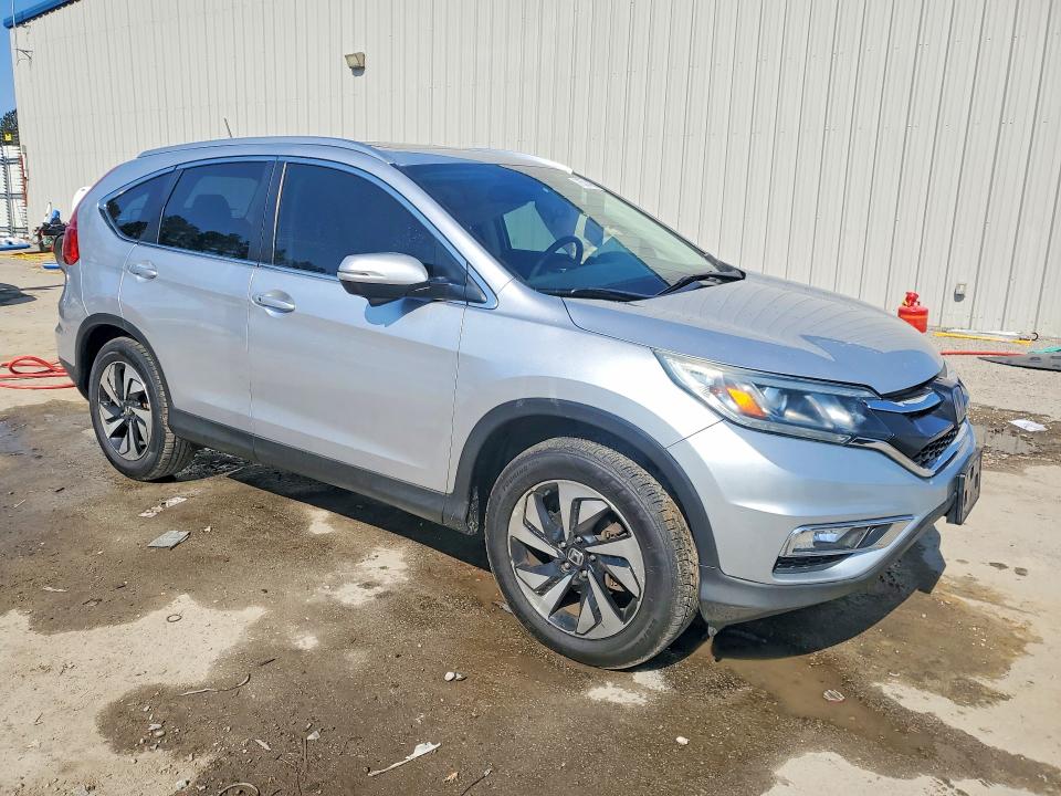 Photo 4 from auction – 2015 HONDA CR-V TOURI with VIN 5J6RM4H98FL075651